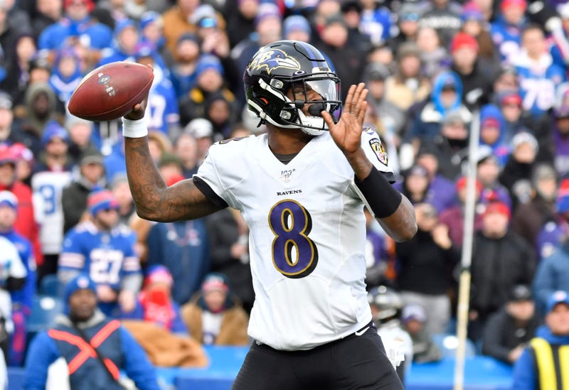 Lamar Jackson Throws A Pass Against The Bills
