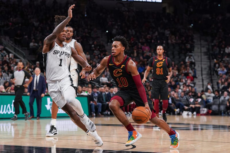 Dec 12, 2019; San Antonio, TX, USA; Cleveland Cavaliers guard Darius Garland (10) dribbles the ball around against San Antonio Spurs guard Lonnie Walker IV (1) in the first half at the AT&T Center. Mandatory Credit: Daniel Dunn-USA TODAY Sports