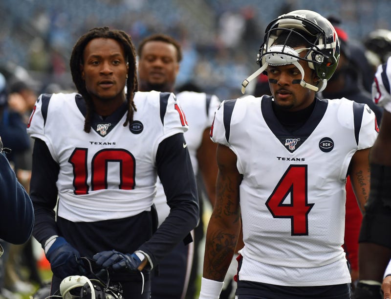 Houston Texans quarterback Deshaun Watson (4) and Houston Texans wide receiver DeAndre Hopkins (10) walk off the field after warmups before the game against the Tennessee Titans at Nissan Stadium.