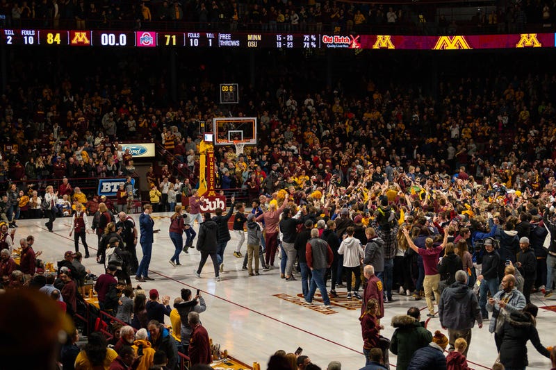 Dec 15, 2019; Minneapolis, MN, USA; Minnesota Gophers fans rush the court following the victory over the Ohio State Buckeyes at Williams Arena.