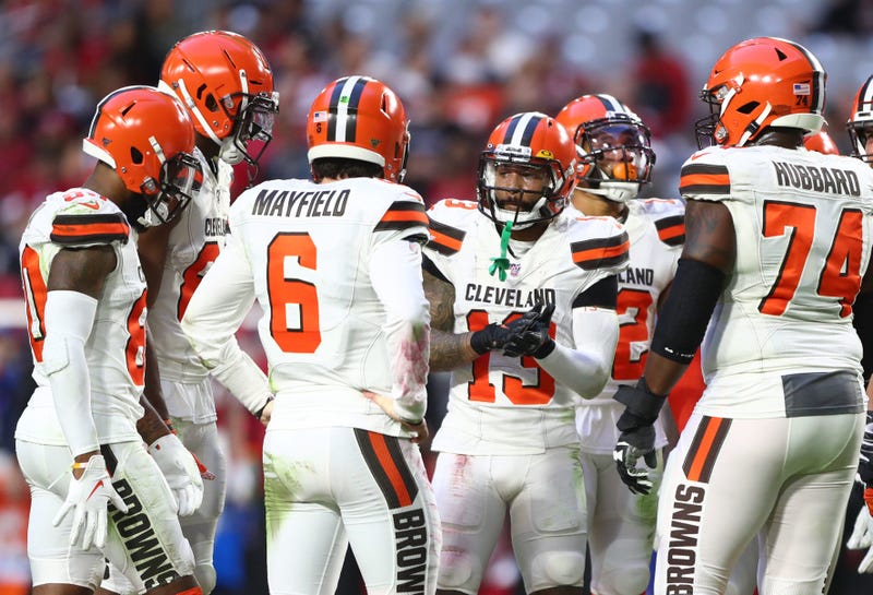Cleveland Browns wide receiver Odell Beckham Jr. (13) in the huddle with quarterback Baker Mayfield (6) against the Arizona Cardinals at State Farm Stadium.
