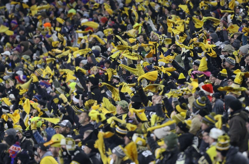 Pittsburgh Steelers fans wave terrible towels against the Buffalo Bills during the fourth quarter at Heinz Field. 