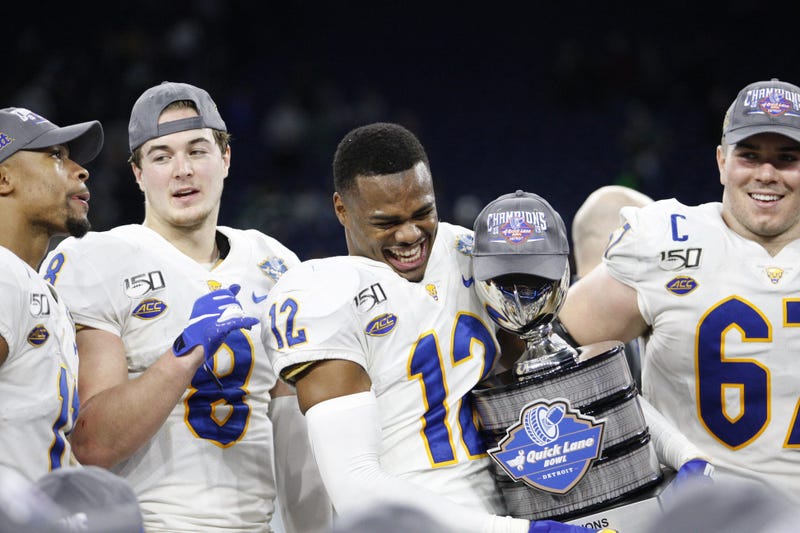Paris Ford celebrates after the Quick Lanes Bowl victory