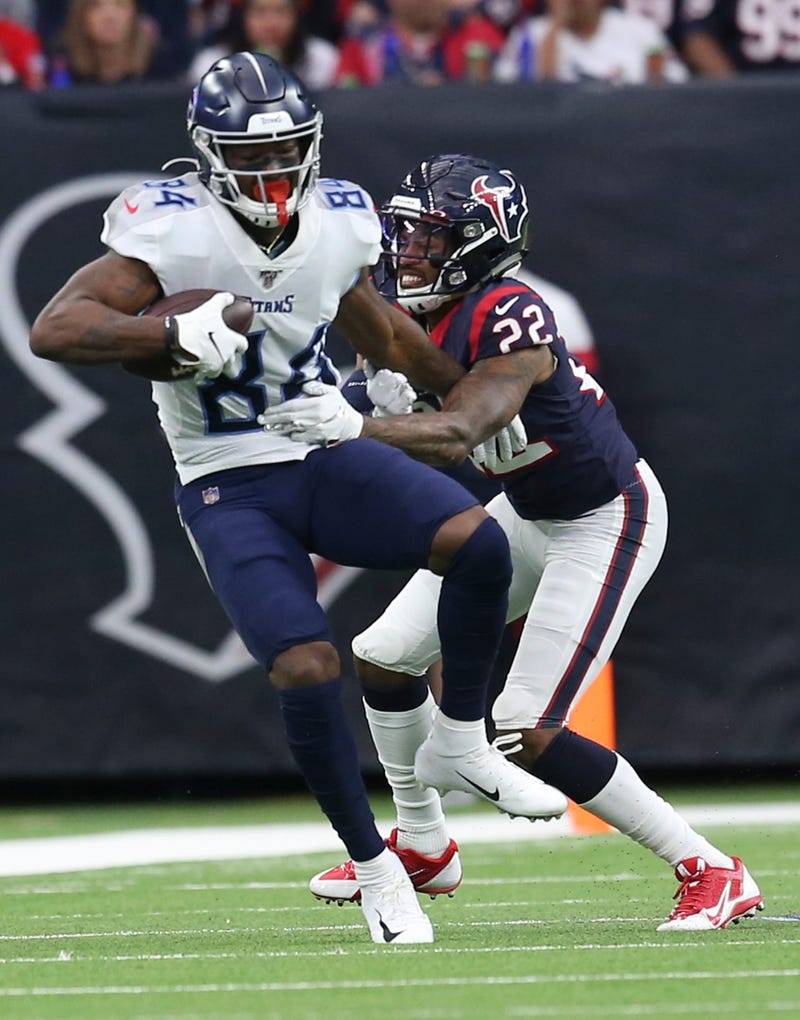 Tennessee Titans wide receiver Corey Davis (84) catches the ball against Houston Texans cornerback Gareon Conley (22) in the second quarter at NRG Stadium.
