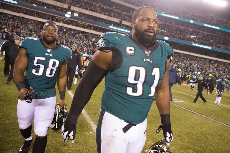 Eagles' Fletcher Cox (91) and Jordan Hicks (58) walk towards (58) walk towards midfield after defeating the Dallas Cowboys 17-9.