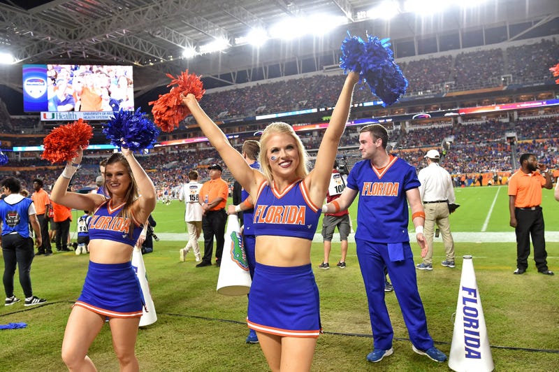 Florida Gators cheerleaders cheers on during the second half against the Virginia Cavaliers in the 2019 Orange Bowl game at Hard Rock Stadium.