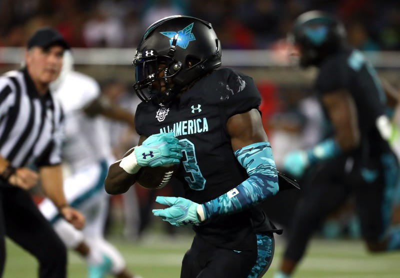 Jan 2, 2020; Orlando, Florida, USA; Team Pressure running back Zachary Evans (3) runs the ball against Team Savage during the first quarter at Camping World Stadium. Mandatory Credit: Kim Klement-USA TODAY Sports