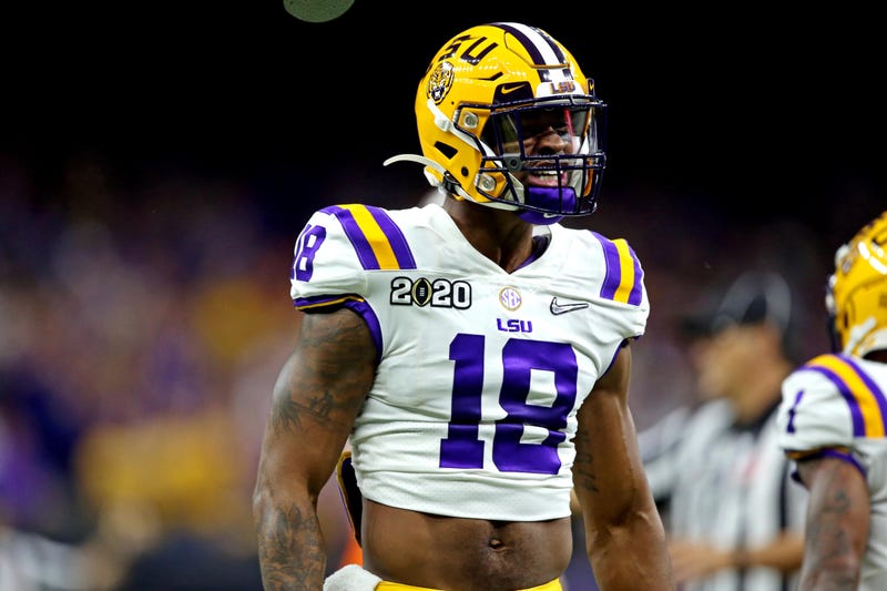 Jan 13, 2020; New Orleans, Louisiana, USA; LSU Tigers linebacker K'Lavon Chaisson (18) reacts during the first quarter against the Clemson Tigersin the College Football Playoff national championship game at Mercedes-Benz Superdome. Mandatory Credit: Chuck