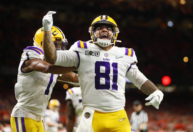 LSU Tigers tight end Thaddeus Moss (81) celebrates after scoring a touchdown against the Clemson Tigers in the third quarter in the College Football Playoff national championship game at Mercedes-Benz Superdome.