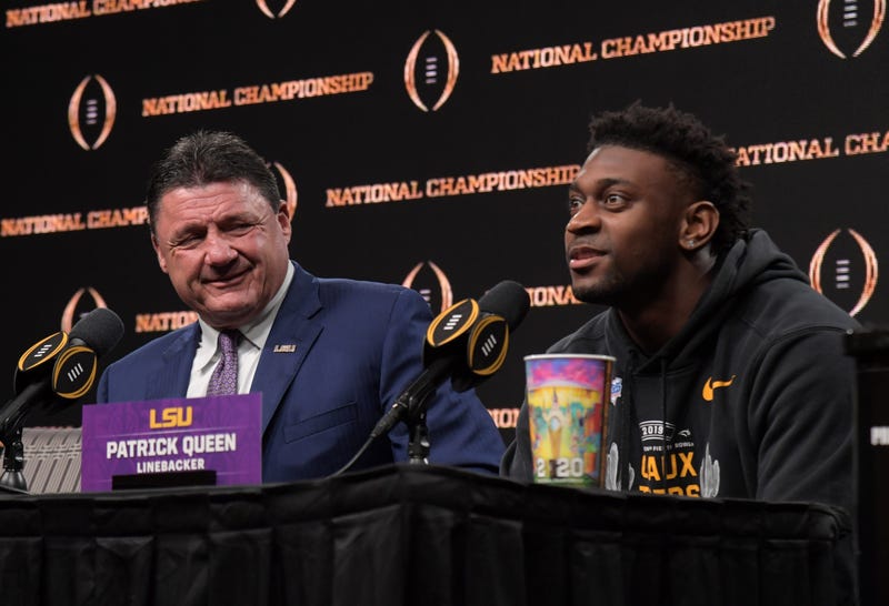 LSU Tigers coach Ed Orgeron (left) and linebacker Patrick Queen during the CFP National Championship champions press conference at the Sheraton New Orleans. LSU defeated Clemson 42-25.