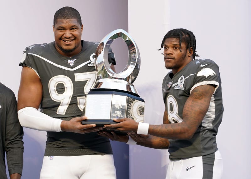 Calais Campbell poses with Lamar Jackson at the Pro Bowl