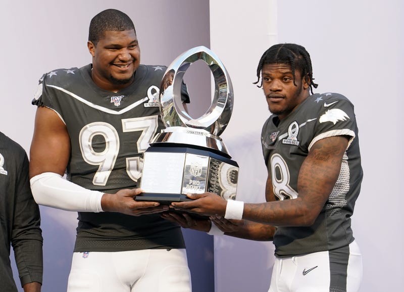 Calais Campbell and Lamar Jackson