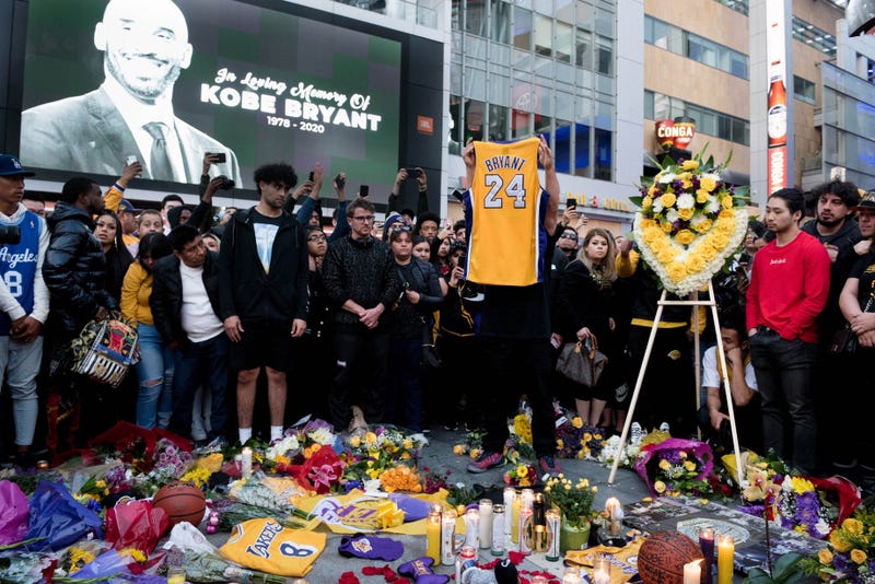 Fans gather at L.A. Live in Los Angeles to pay their respects to former Los Angeles Lakers guard Kobe Bryant who died in helicopter crash on Sunday