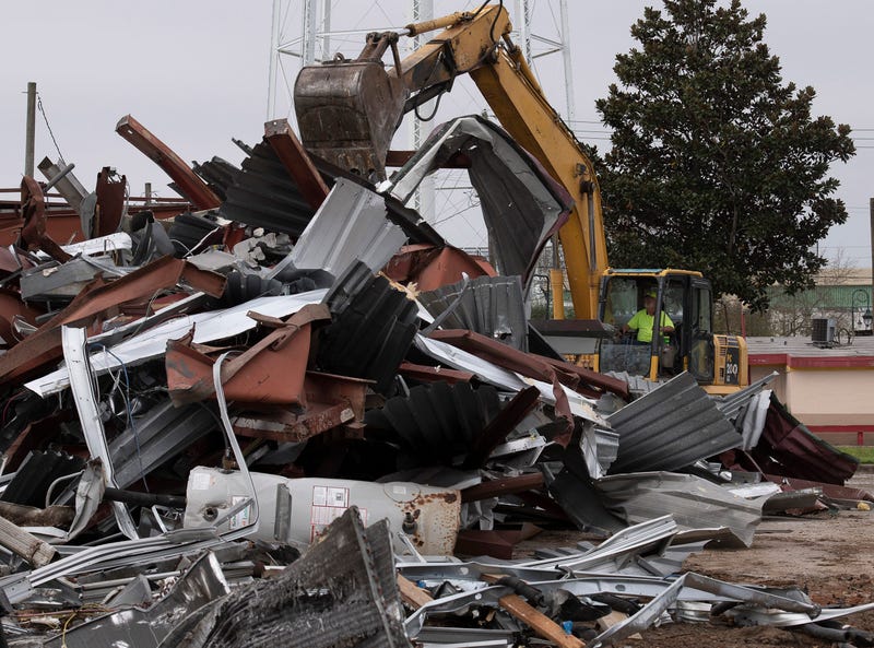 Maverick McCoy of Emerald Coast Demolition tears down the old Seville Diner/Pot Roast and Pinot building on Cervantes Street on Monday, Feb. 10, 2020. Cervantes Street Diner Demo
