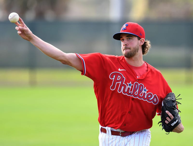 Philadelphia Phillies pitcher Aaron Nola (27) throws during Wednesday's spring training workout at Spectrum Field.