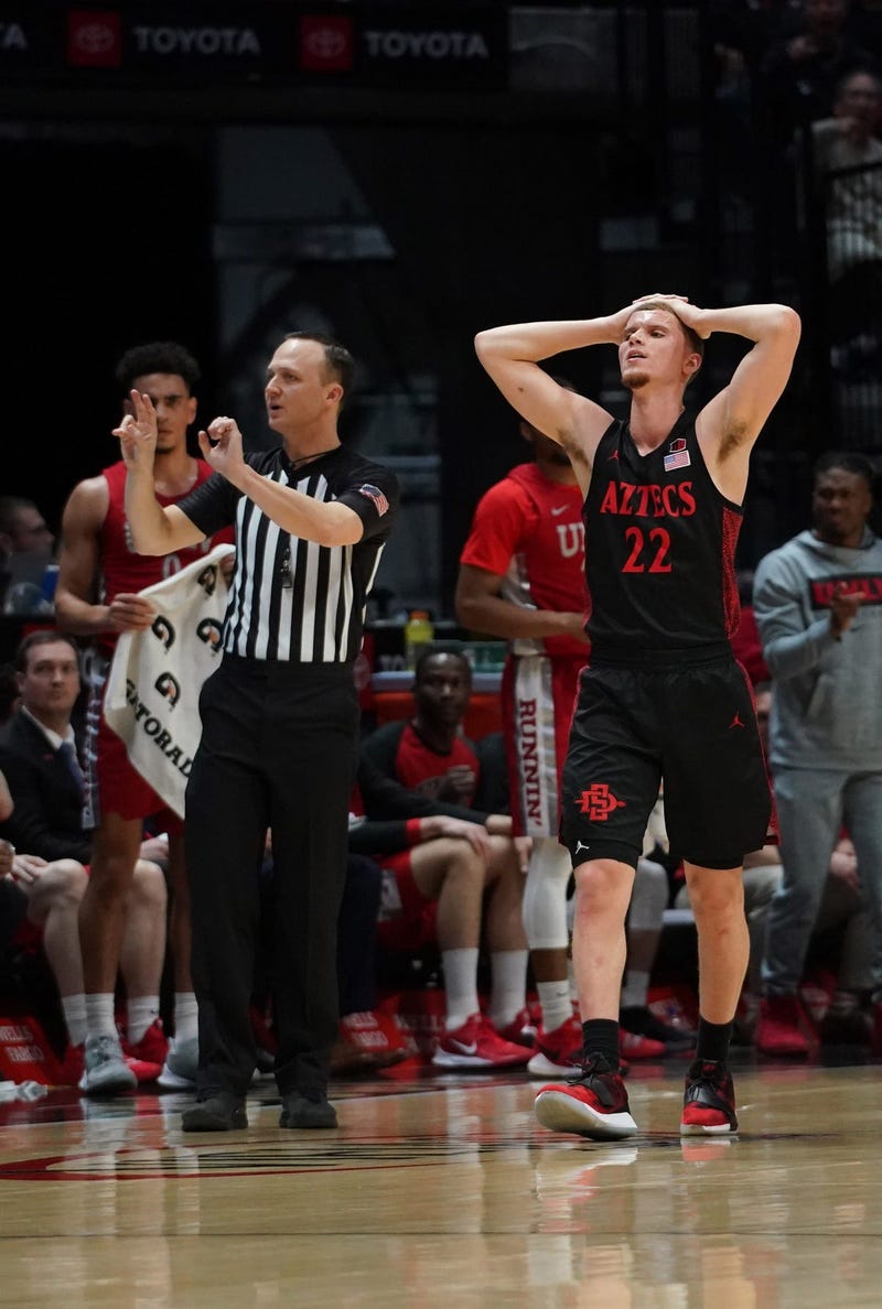 Malachi Flynn is disgruntled after his third foul