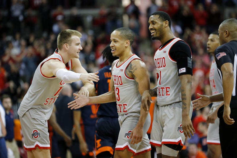 Mar 5, 2020; Columbus, Ohio, USA; Ohio State Buckeyes guard CJ Walker (center) celebrates with guard Luther Muhammad (right) and forward Justin Ahrens (left)as time winds down during the second half against the Illinois Fighting Illini at Value City Arena