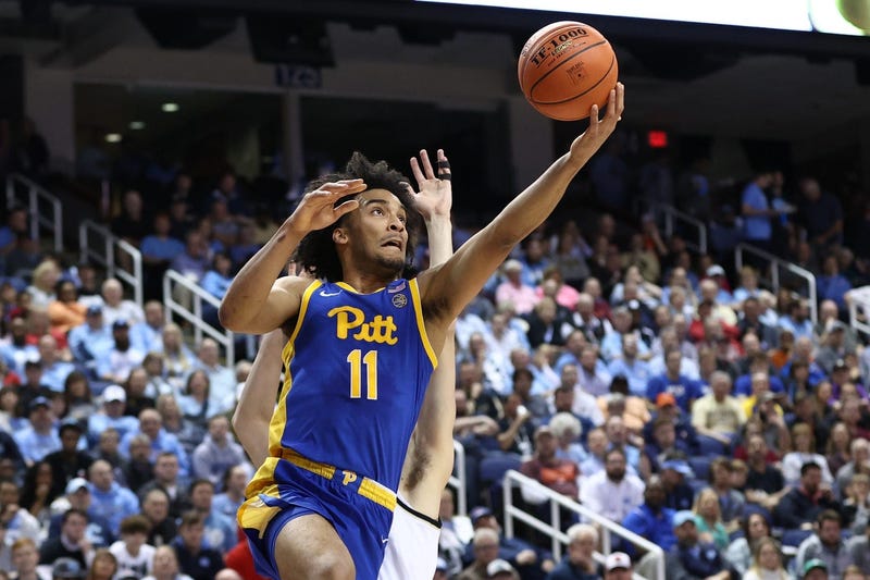 Mar 10, 2020; Greensboro, North Carolina, USA; Pittsburgh Panthers guard Justin Champagnie (11) goes up for a shot against the Wake Forest Demon Deacons at Greensboro Coliseum.
