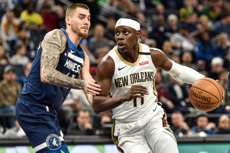 New Orleans Pelicans guard Jrue Holiday (11) and Minnesota Timberwolves forward Juan Hernangomez (41) in action at Target Center.