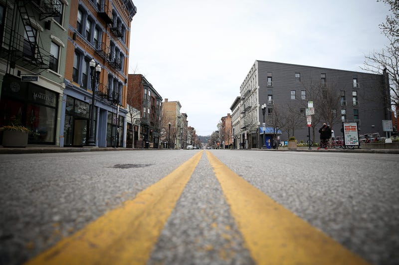 View looking north of Vine Street, Tuesday, March 24, 2020, in Cincinnati's Over-the-Rhine neighborhood. Tuesday was the first day of Ohio Gov. Mike DeWine's shelter-in-place order in response to the new coronavirus pandemic. All non-essential businesses 