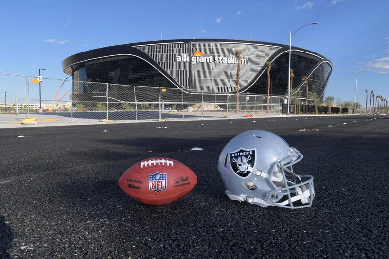 General overall aerial view of Las Vegas Raiders helmet and Wilson 2020 NFL The Duke official football at the Allegiant Stadium construction site. 