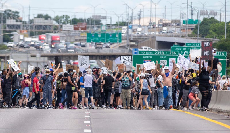 Protesters rush to shut down Interstate 35