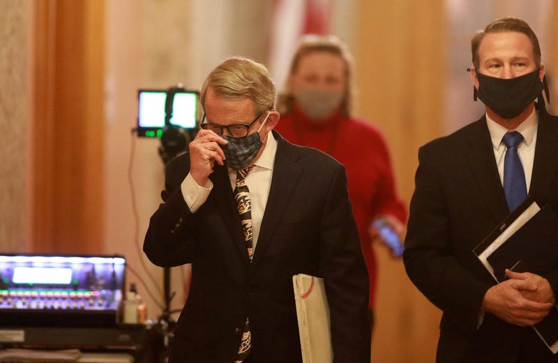 Mike DeWine (left) and Lt. Gov. Jon Husted wear their masks while walking into the daily coronavirus news conference on Friday, April 17, 2020 at the Ohio Statehouse in Columbus, Ohio. 