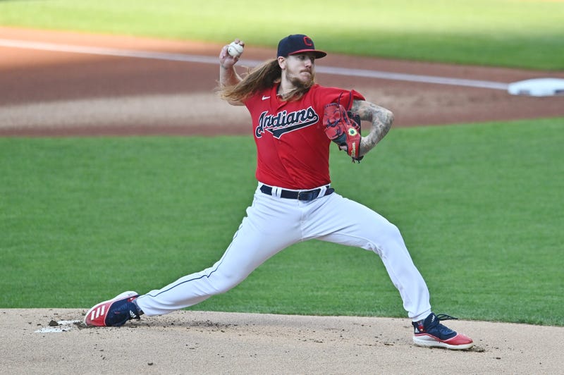 Aug 5, 2020; Cleveland, Ohio, USA; Cleveland Indians starting pitcher Mike Clevinger (52) throws a pitch during the first inning against the Cincinnati Reds at Progressive Field. Mandatory Credit: Ken Blaze-USA TODAY Sports