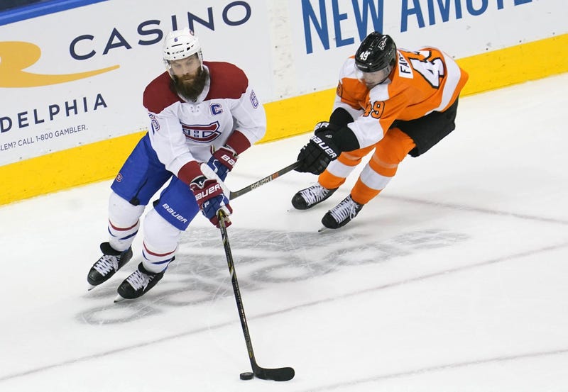 Montreal Canadiens defenseman Shea Weber (6) moves the puck against Philadelphia Flyers left wing Joel Farabee (49) during the third period in game five of the first round of the 2020 Stanley Cup Playoffs at Scotiabank Arena.