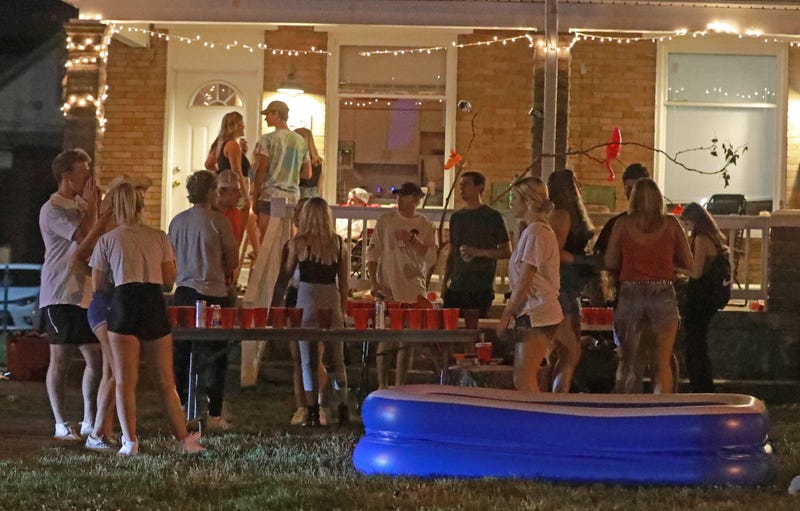 Off-campus porch and yard parties near the Ohio State University campus in Columbus were packed Thursday, August 20, 2020. Few masks were visible even though the COVID-19 pandemic is rampant. A mix of online and in-person classes begin August 25, 2020 at