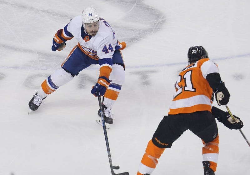 New York Islanders center Jean-Gabriel Pageau (44) defends against Philadelphia Flyers center Scott Laughton (21) during the third period in game one of the second round of the 2020 Stanley Cup Playoffs at Scotiabank Arena.