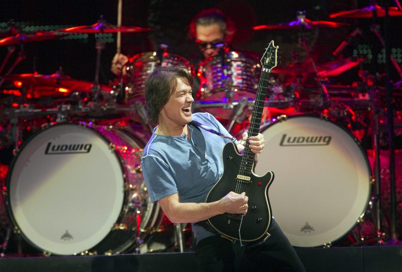 February 22, 2012; Indianapolis, IN, USA; Eddie Van Halen plays a solo at Bankers Life Fieldhouse during the set of Van Halen, Indianapolis, Wednesday, February 22, 2012. Mandatory Credit: Robert Scheer-USA TODAY NETWORK