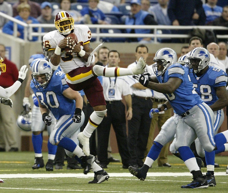 Sean Taylor reels in an onside kick attempt