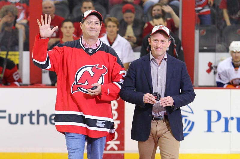 New Jersey Devils owners David Blitzer and Josh Harris take the ice before the first period of the game between the Devils and the New York Islanders at the Prudential Center. 