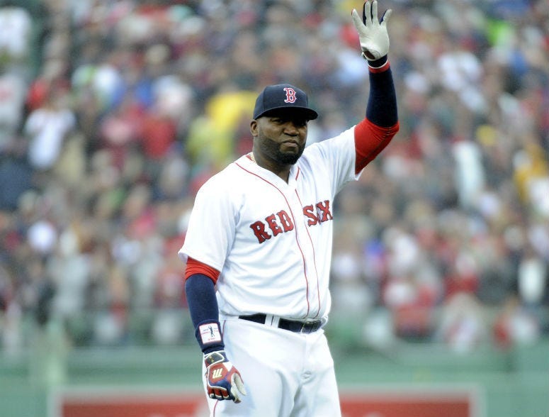 Oct 2, 2016; Boston, MA, USA; Boston Red Sox designated hitter David Ortiz (34) acknowledges the crow as part of pre game ceremonies in his honor prior to a game against the Toronto Blue Jays at Fenway Park.