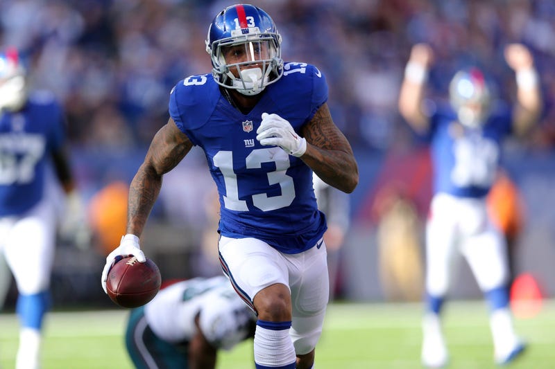 Nov 6, 2016; East Rutherford, NJ, USA; New York Giants wide receiver Odell Beckham Jr. (13) runs for a touchdown against the Philadelphia Eagles during the first quarter at MetLife Stadium. Mandatory Credit: Brad Penner-USA TODAY Sports