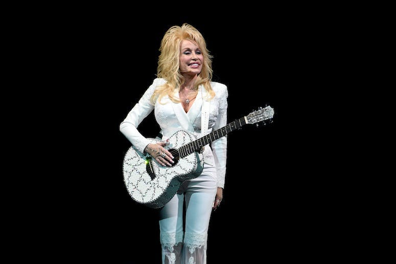 Dolly Parton, Concert, BB&T Center, White Suit, Guitar, Smile, 2016