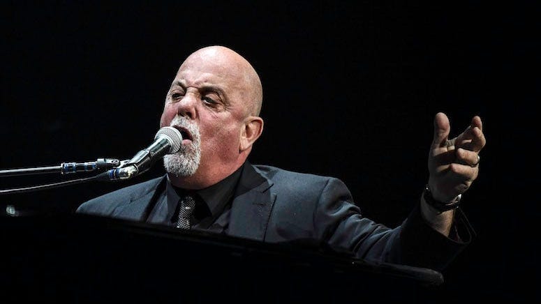 Billy Joel Plays Piano Discarded on Sidewalk