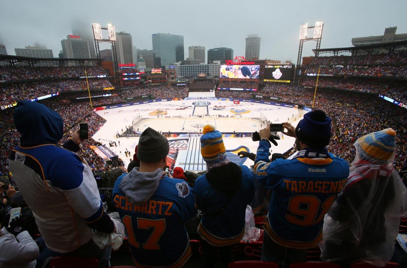 St. Louis Blues fans take photos before the Winter Classic.