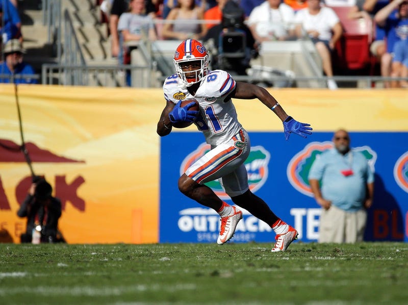 Florida Gators wide receiver Antonio Callaway (81) runs with the ball against the Iowa Hawkeyes 