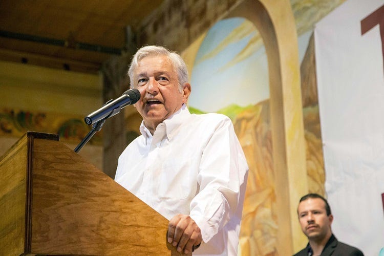 Popular politician in Mexico, Andres Manuel Lopez Obrador, was greeted by over 500 people during his visit in Phoenix at Salon Tradiciones to speak about a immigration, and President Trump.