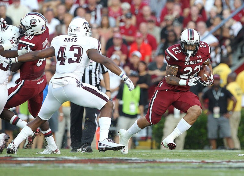South Carolina running back Brandon Wilds (22) picks up yards in the first half against Texas A&M at Williams-Brice Stadium in Columbia, S.C., on Thursday, Aug. 28, 2014. (Photo by Kim Kim Foster-Tobin/The State/MCT/Sipa USA)