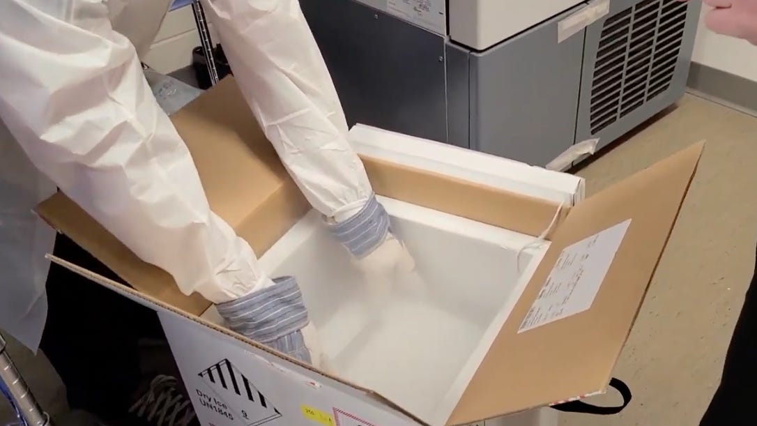 WATCH: St. Louis hospital unboxes first doses of COVID-19 vaccine