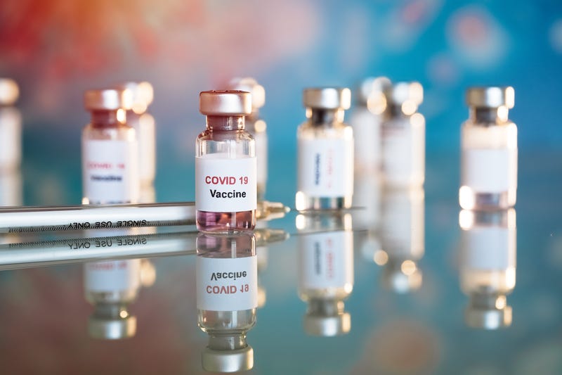 COVID-19 vaccine and syringe injection