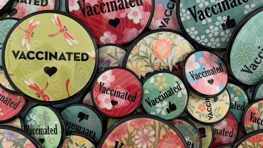 Evanston business owner selling ‘vaccinated’ pins to help identify those who got shots