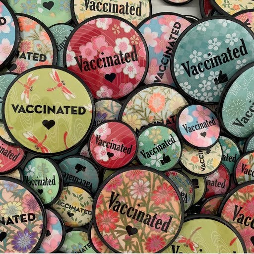 Evanston business owner selling ‘vaccinated’ pins to help identify those who got shots