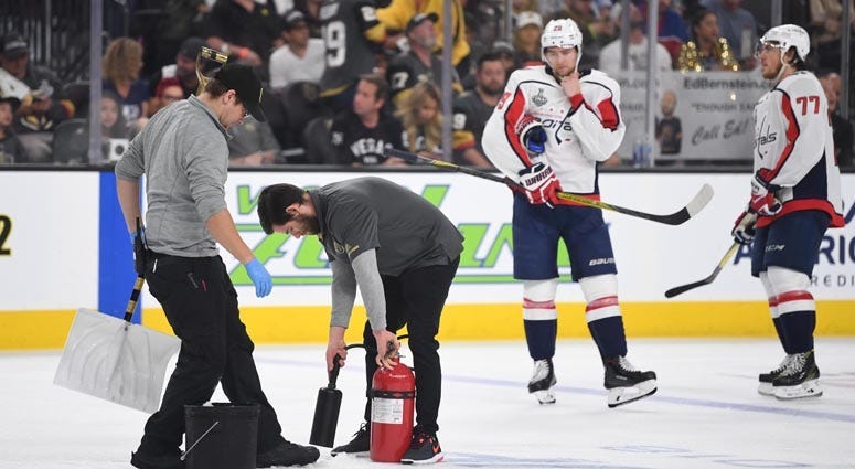 Workers fix the ice in the third period in Game 1 of the Stanley Cup Final on May 28, 2018, at T-Mobile Arena in Las Vegas.