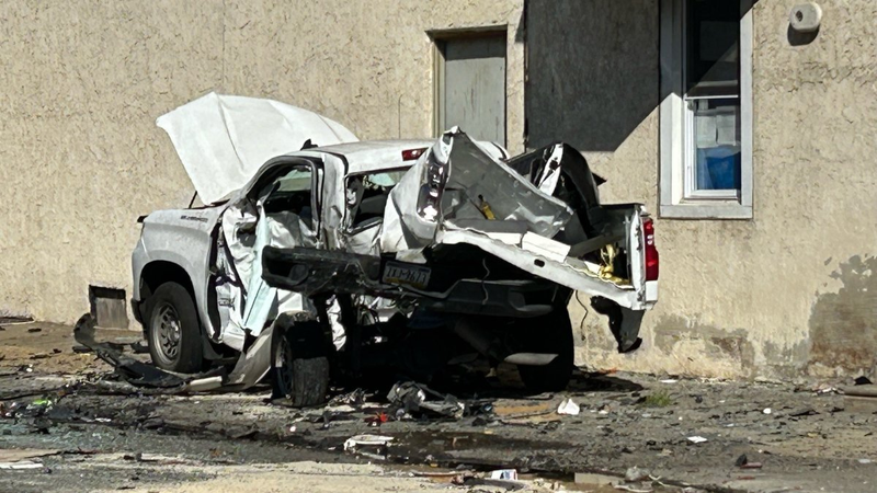The driver of this truck is in critical condition at a Philadelphia hospital. A hit-and-run driver ignored a red light, flew through an intersection, slammed into the driver's side of this truck, and immediately fled the scene with his passengers.