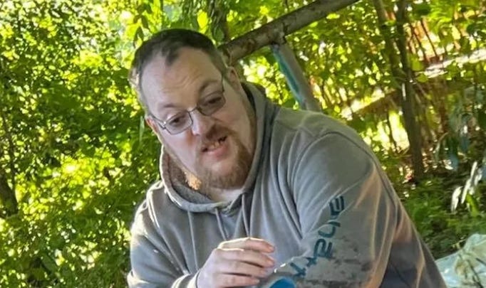 A homeless man was charged with multiple felonies in the shooting death of a 44-year-old Redford man and his cat at a rural cottage in Tuscola County one week ago, authorities announced.