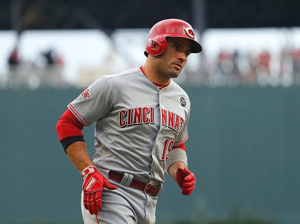 Reds slugger Joey Votto rounds the bases after hitting a home run. 